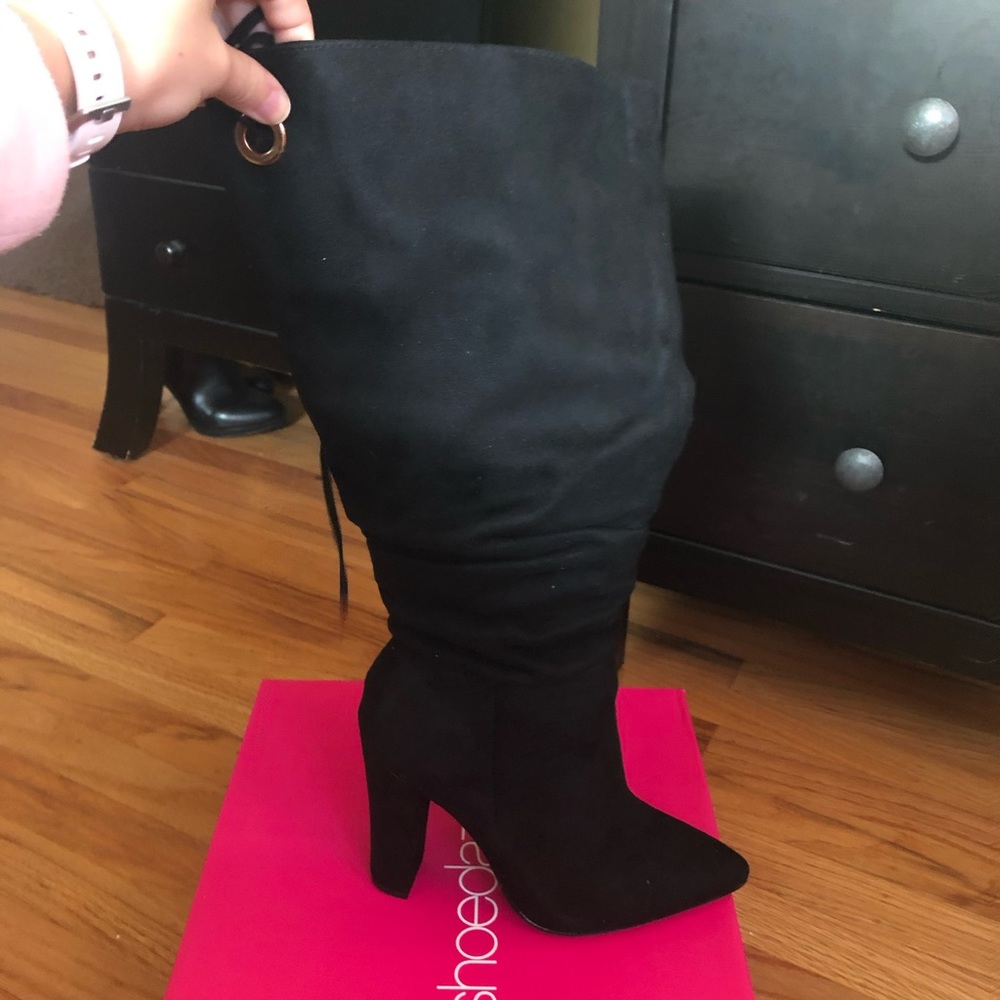 Brand new, never worn black healed boots